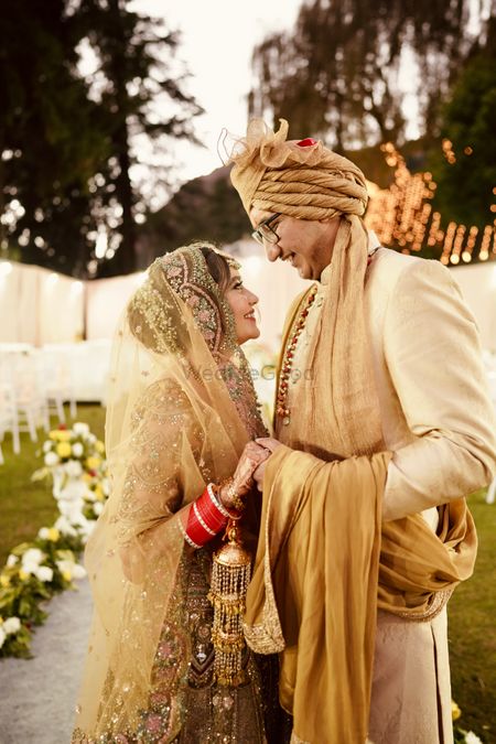 Candid couple portrait in gold theme