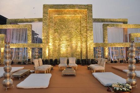 Photo of Stage decor in white with floral wall