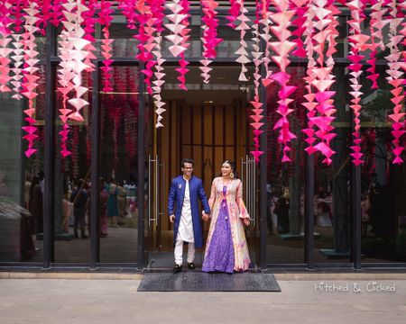 Photo of Suspended pink paper decor for mehendi