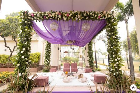 purple floral mandap simple and nice for home wedding
