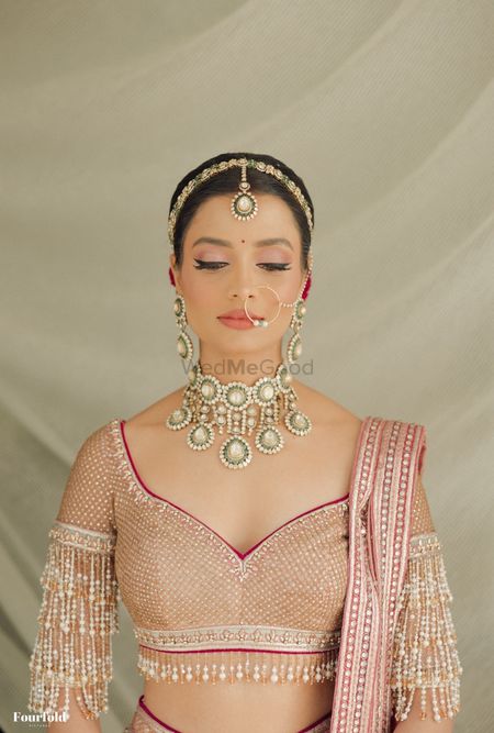 Photo of Gorgeous bridal jewellery in jadau and polki style for the wedding day