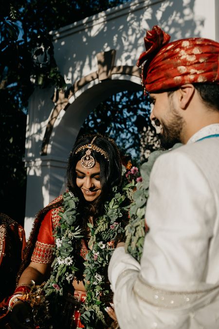 Bride and groom during varmala 