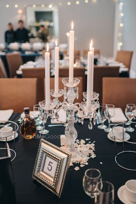 Photo of candlestand table centerpiece