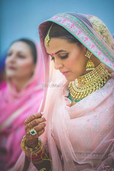 Neha Dhupa makes for a shy bride in light pink outfit at her anand karaj