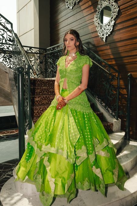 Stunning lime green layered lehenga with a jacket style blouse for the mehendi look