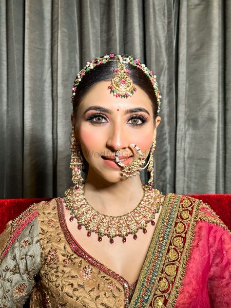 bold eyes with a minimal face for a royal bridal look