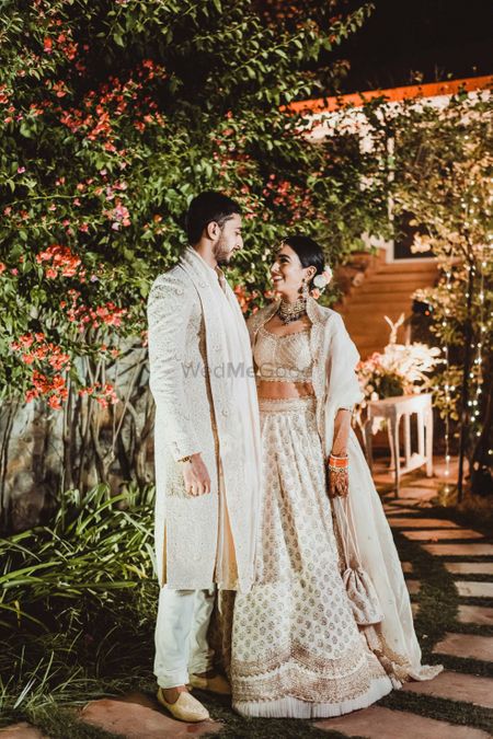 bride in a simple ivory lehenga for her intimate wedding