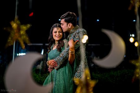 Photo of Cute couple portrait at the sangeet