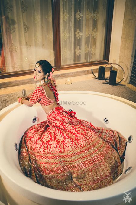 Bride in bath tub getting ready shot idea 
