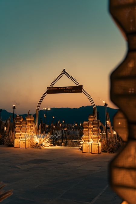 Super chic rustic decor for the entrance for this cocktail sangeet night event