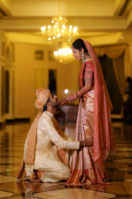 Couple dressed in pastel hues for their South indian wedding.