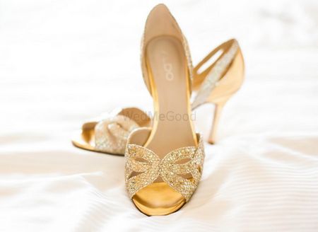 Photo of gold shoes from Aldo