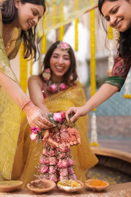 Unique Pose Idea for Bride and Bridesmaid on Haldi