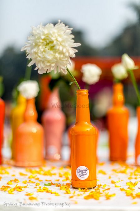 Photo of handpainted bottles as table centerpieces