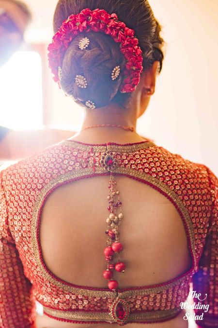 Bridal back with bun and keyhole style blouse