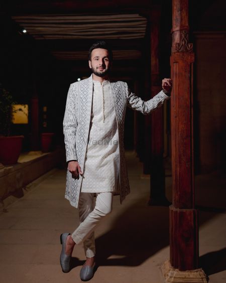 Photo of Unique grey and ivory groom sherwani with intricate detailing