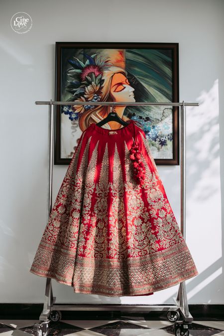 Photo of Sabyasachi bridal lehenga on a hanger
