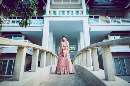 A stunning bridal portrait with a bride in pink 