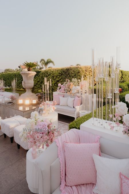 Photo of Blush pink and white decor with pastel flowers for day event