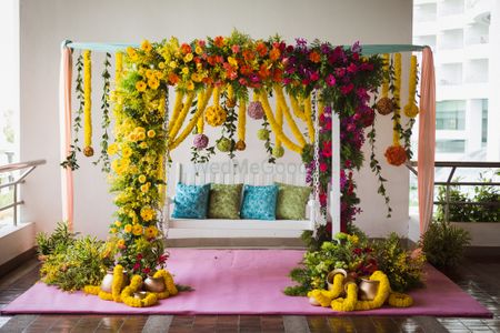 Photo of Pretty floral swing for mehendi