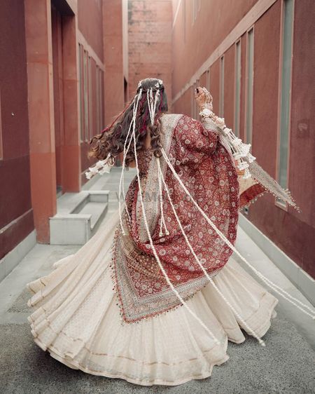 Photo of twirling bride on haldi