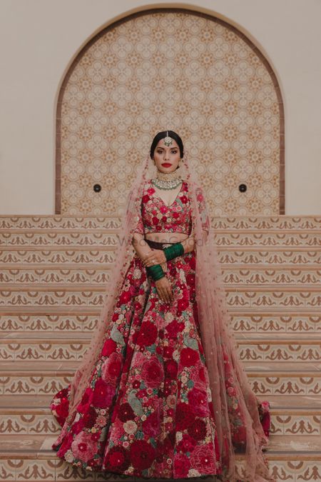 A bride in gorgeous floral lehenga
