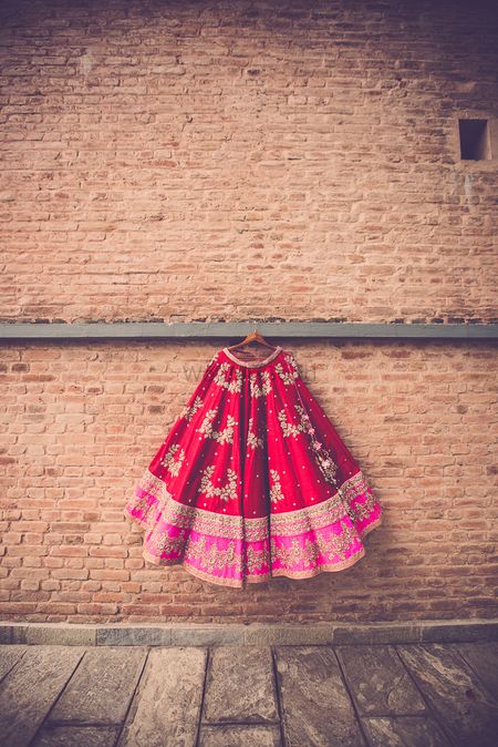 Red and Pink Hanging Lehenga by Anushree Reddy