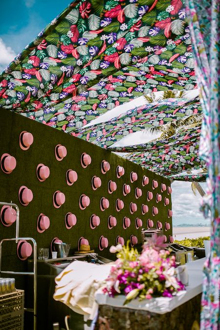 Floral tent with hat backdrop for mehendi 