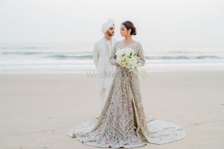 beachside couples poses for nikah ceremony