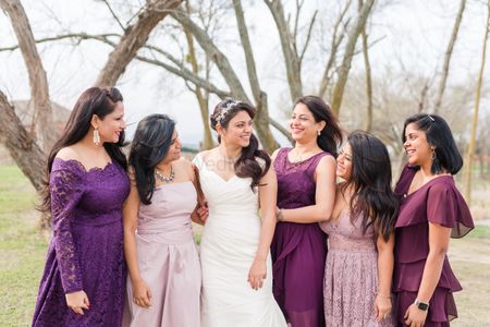 Bride with matching bridesmaids in purple 