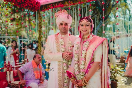 A bride and groom color coordinate on the wedding day