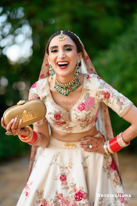 Striking gold bridal clutch with Taj Mahal motif