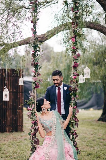 Photo of Idea: Floral swing on the engagement instead of a stage