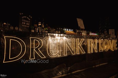 Photo of Fun signage for a glam bar decor for the engagement night