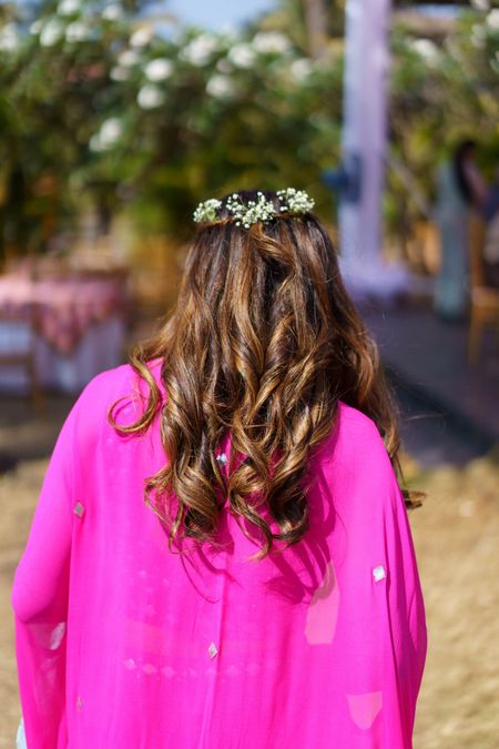 open hair with floral crown hairstyle for the mehendi