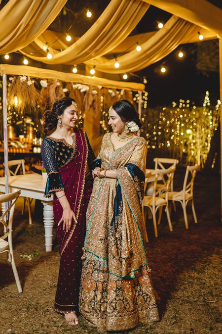 Photo of Bride with her sister on Sangeet