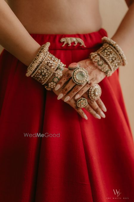 Stunning bridal bangle stack with statement polki and jadau kadas and rings