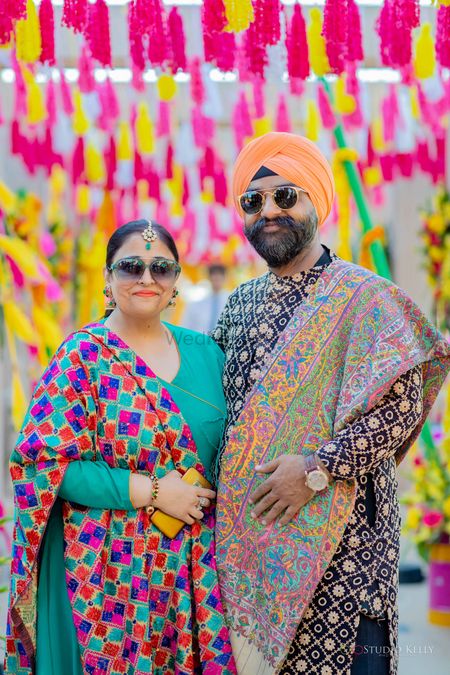 parents of the bride in phulkari outfits 
