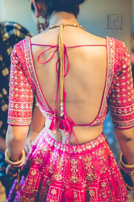 Deep bridal blouse back design 