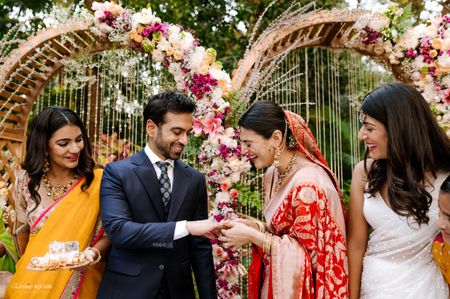Photo of Happy couple ring exchange shot during wedding