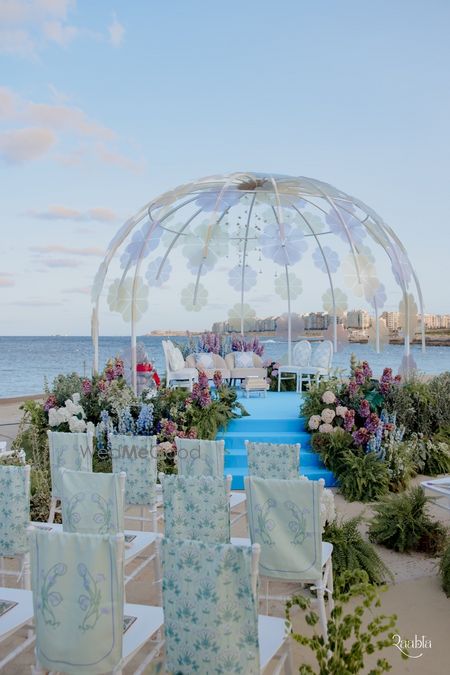 Photo of Unique stained glass mandap for a beach side outdoor day wedding