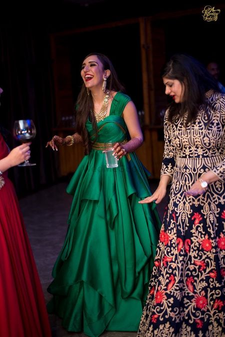 Photo of Dark green flared gown for sangeet