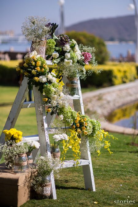 Wooden ladder with floral arrangements