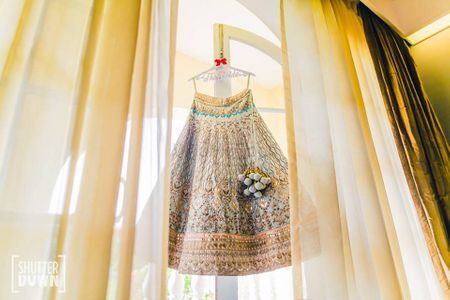 Photo of Unique lehenga on hanger in peach and mint