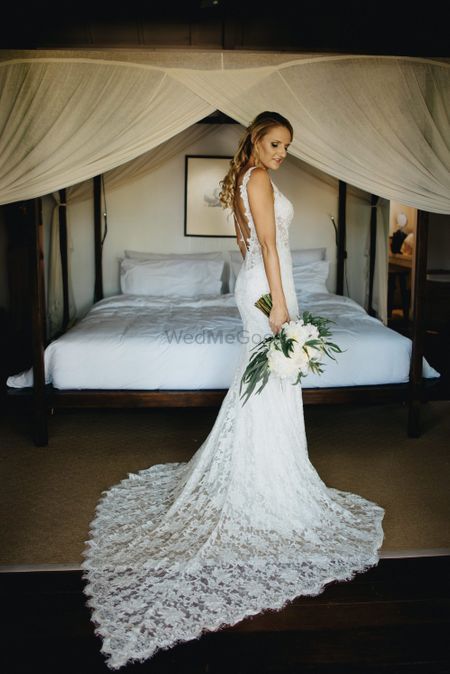 Lace wedding gown with train