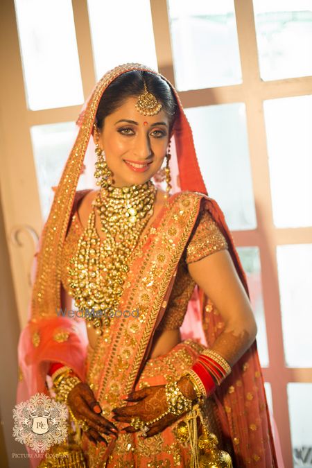 Layered polki jewellery on Indian bride