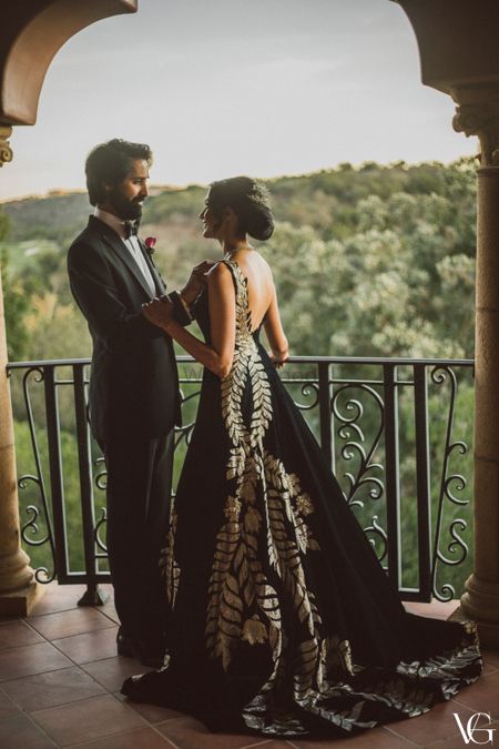 Photo of Couple cocktail portrait with bride in a manish malhotra gown