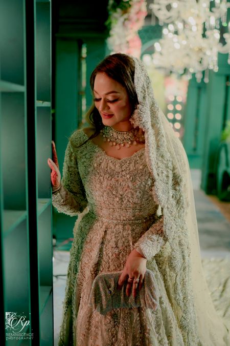 Muslim bride in a silver gown 