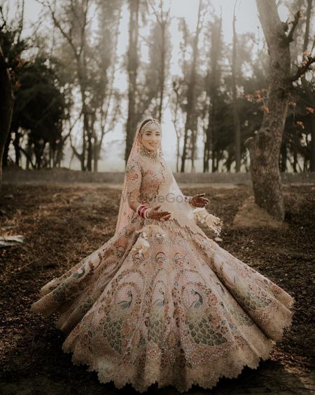 Photo of beautiful Anand Karaj twirling bride