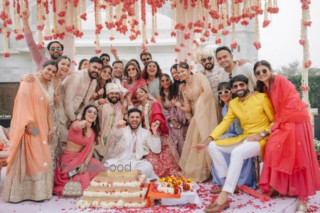 Photo of Fun family group photo at the mandap with the whole family